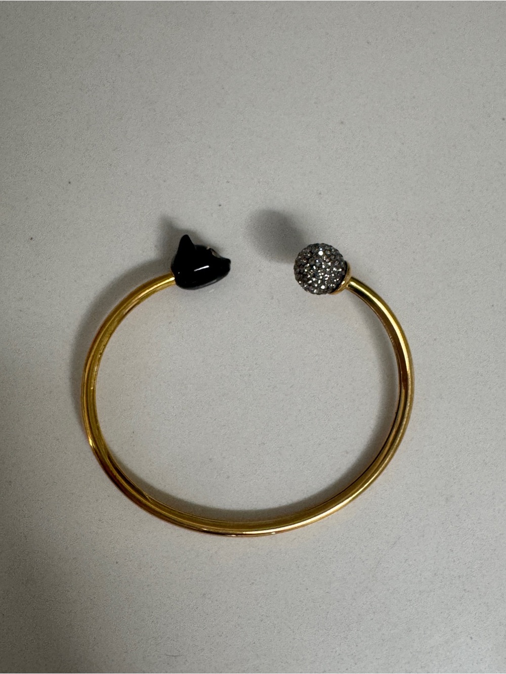 Kate Spade Gold Open Cuff Bracelet with Black Cat Accent and Crystal Ball